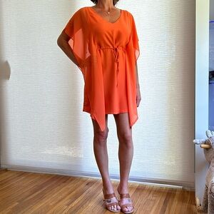 Bebe classic orange dress with sheer detail just worn few times